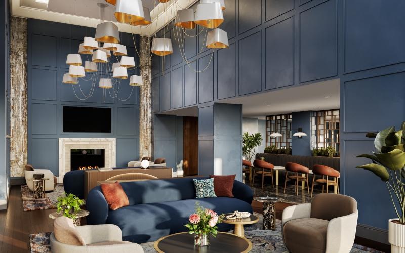 a room with a tv fireplace chandelier and couches